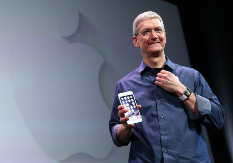 CUPERTINO, CA - SEPTEMBER 09:  Apple CEO Tim Cook shows off the new iPhone 6 and the Apple Watch during an Apple special event at the Flint Center for the Performing Arts on September 9, 2014 in Cupertino, California. Apple is expected to unveil the new iPhone 6 and wearble tech.  (Photo by Justin Sullivan/Getty Images)